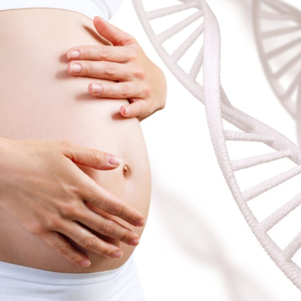 Image of a pregnant woman holding her belly with a rendering of DNA in the background.